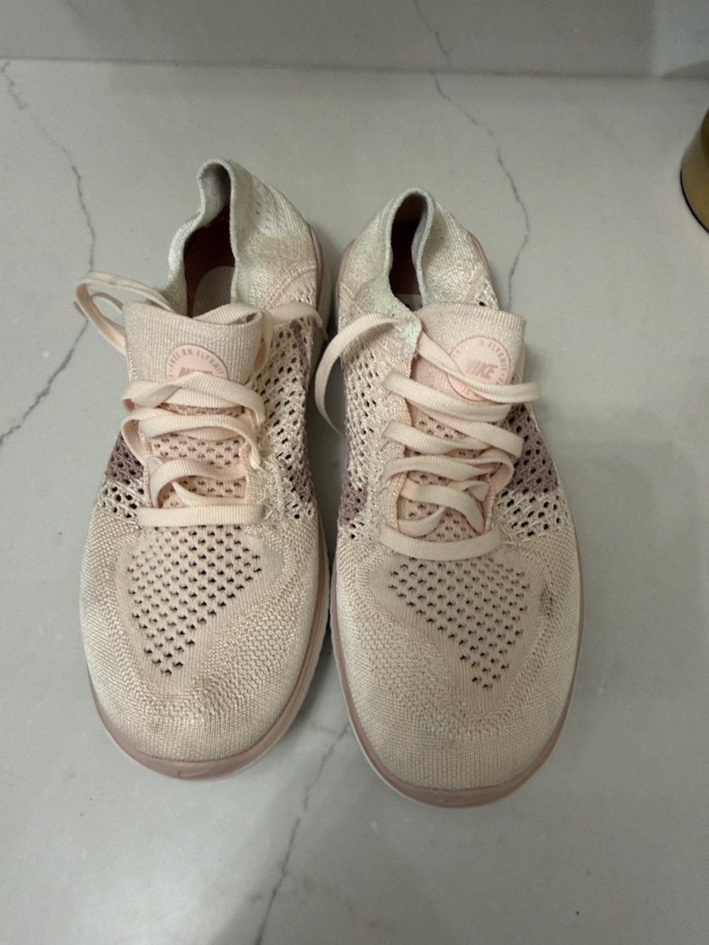 Nike Women’s Flyknit Sneakers - Pale Blush Pink